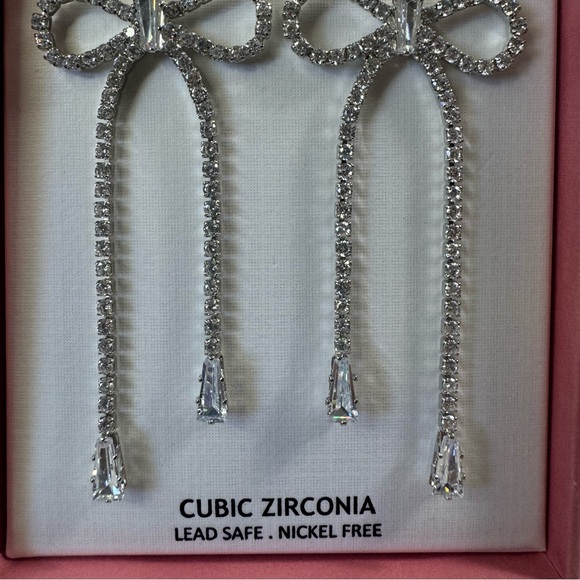 Sincerely Jules Cubic Zirconia Bow Earrings (Silver) - Picture 11 of 14